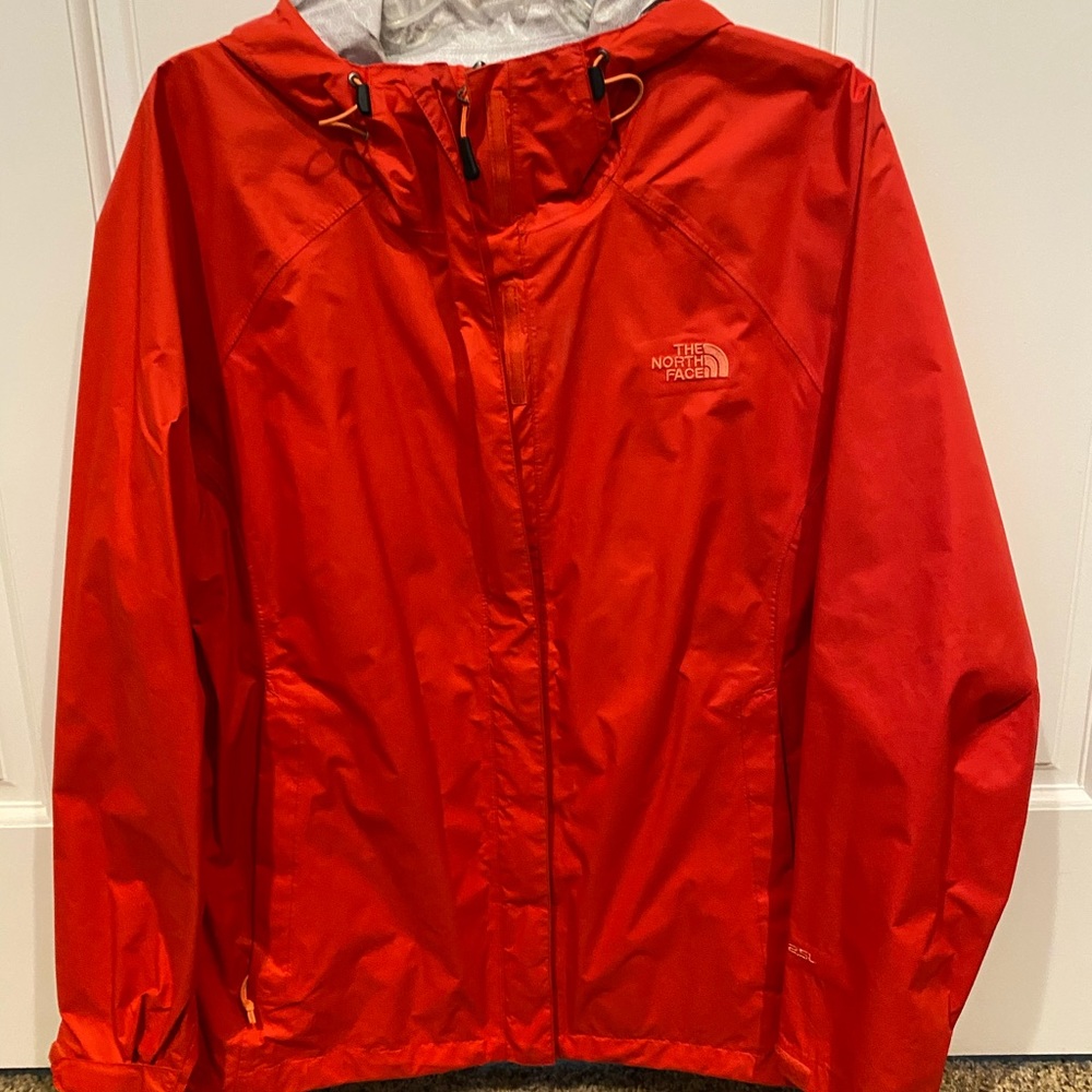 Red/orange north face rain coat